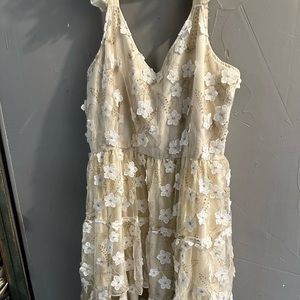 Large floor length floral dress with ruffle sleeves